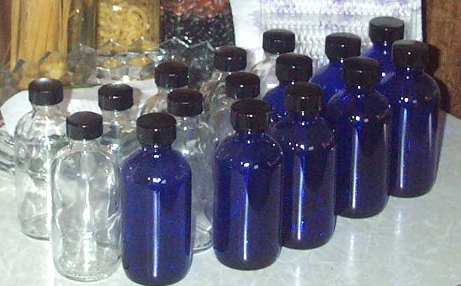blue and clear bottles for herbal products
