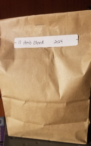 Herb tea blend in paper bag